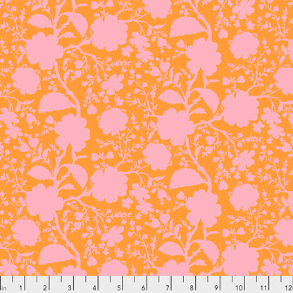 True Colors Wildflower in Blossom features bold pink silhouettes of tangled blooming vines contrasted against a peach background. This modern floral print highlights interesting color combinations, kickstarts quilts, and brings every project to life.