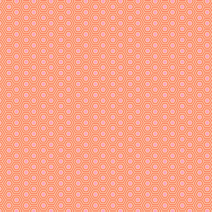 True Colors Hexy in Peach Blossom features soft pink dots that form the centers of small peach hexagons.