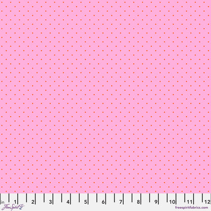 True Colors Tiny Dots in Candy features tiny red pin dots on a pink background.