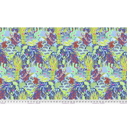 Colorful underwater scene with sea creatures and coral on a blue background with a ruler for scale