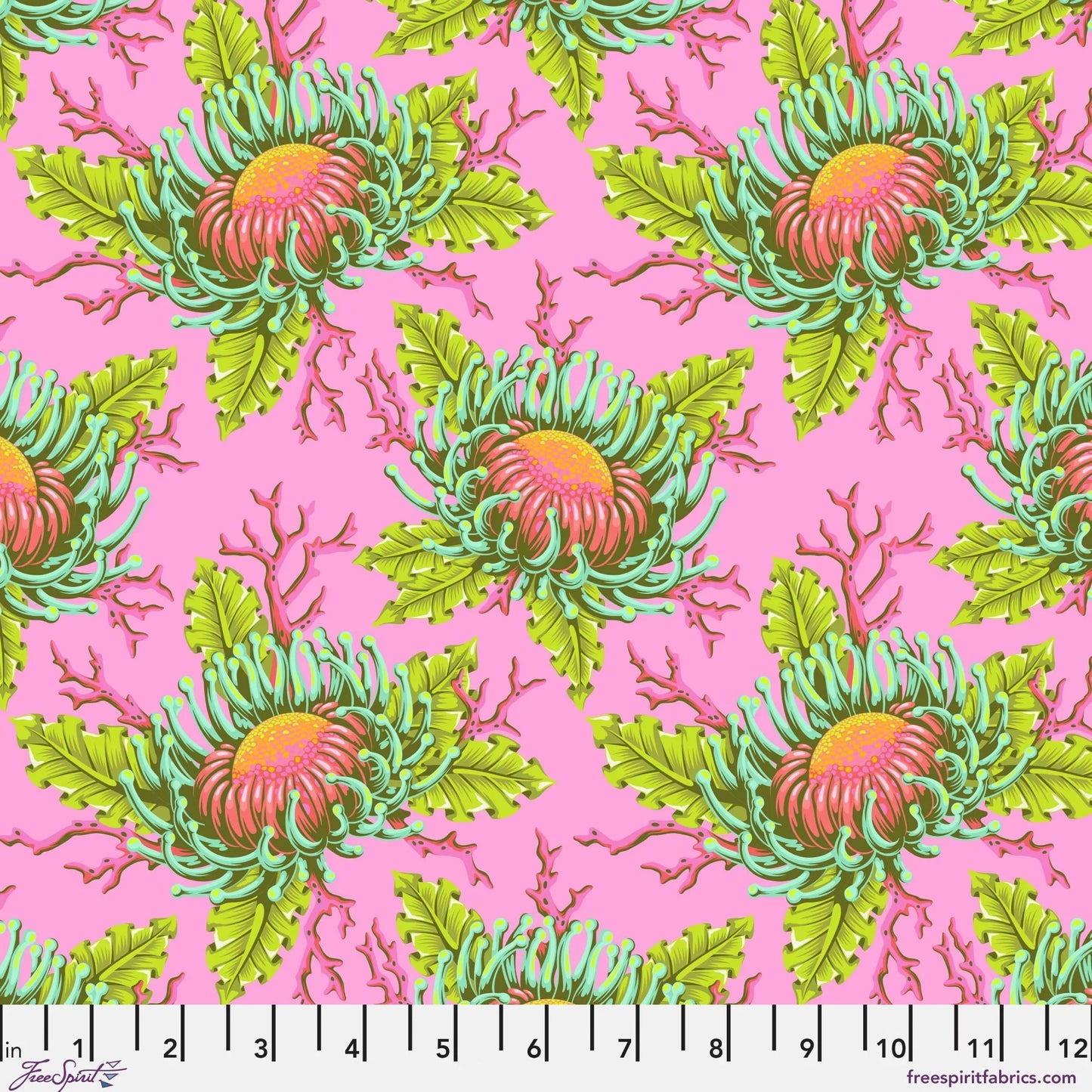 Pattern of large orange and pink sea anemone blooms with lime-green leaves on a bright pink background with a ruler for scale.