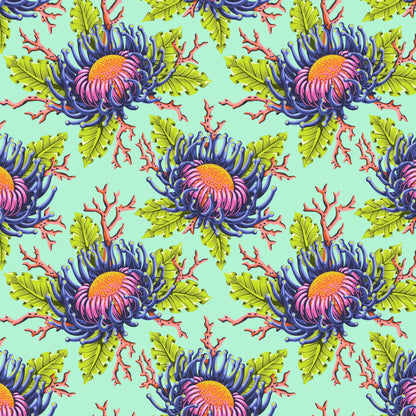 Pattern of large blue and pink sea anemone blooms with lime-green leaves on a bright aqua background.