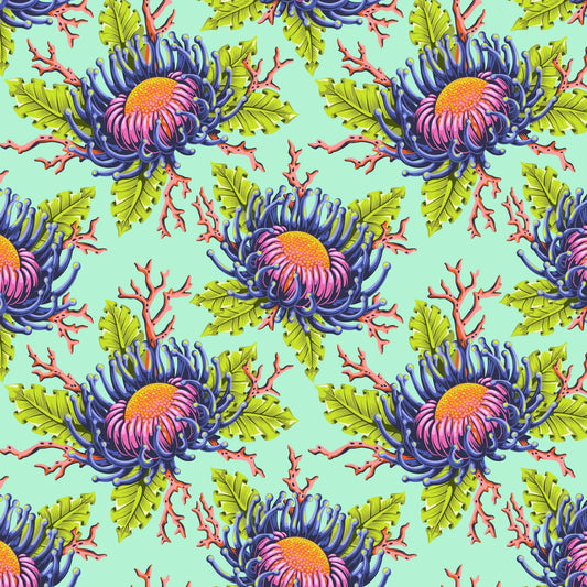 Pattern of large blue and pink sea anemone blooms with lime-green leaves on a bright aqua background.