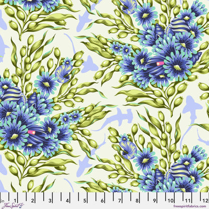 Bouquets of blue sea anemones and kelp with lavender silhouettes of sharks on an off-white background. Ruler at the bottom for scale.