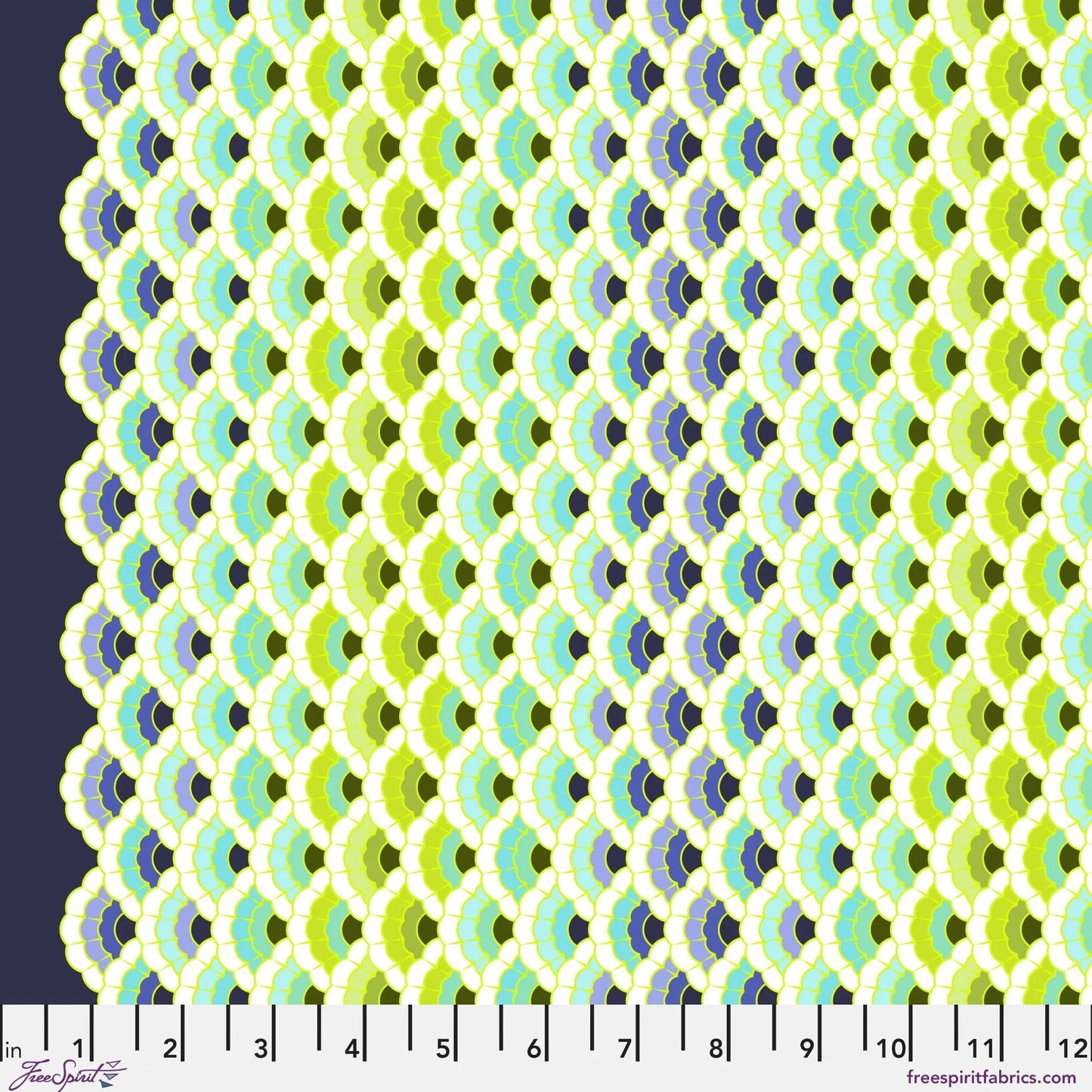 Geometric pattern of overlapping scalloped shapes with green, blue, navy, and turquoise colors on a dark background with a ruler for scale. 