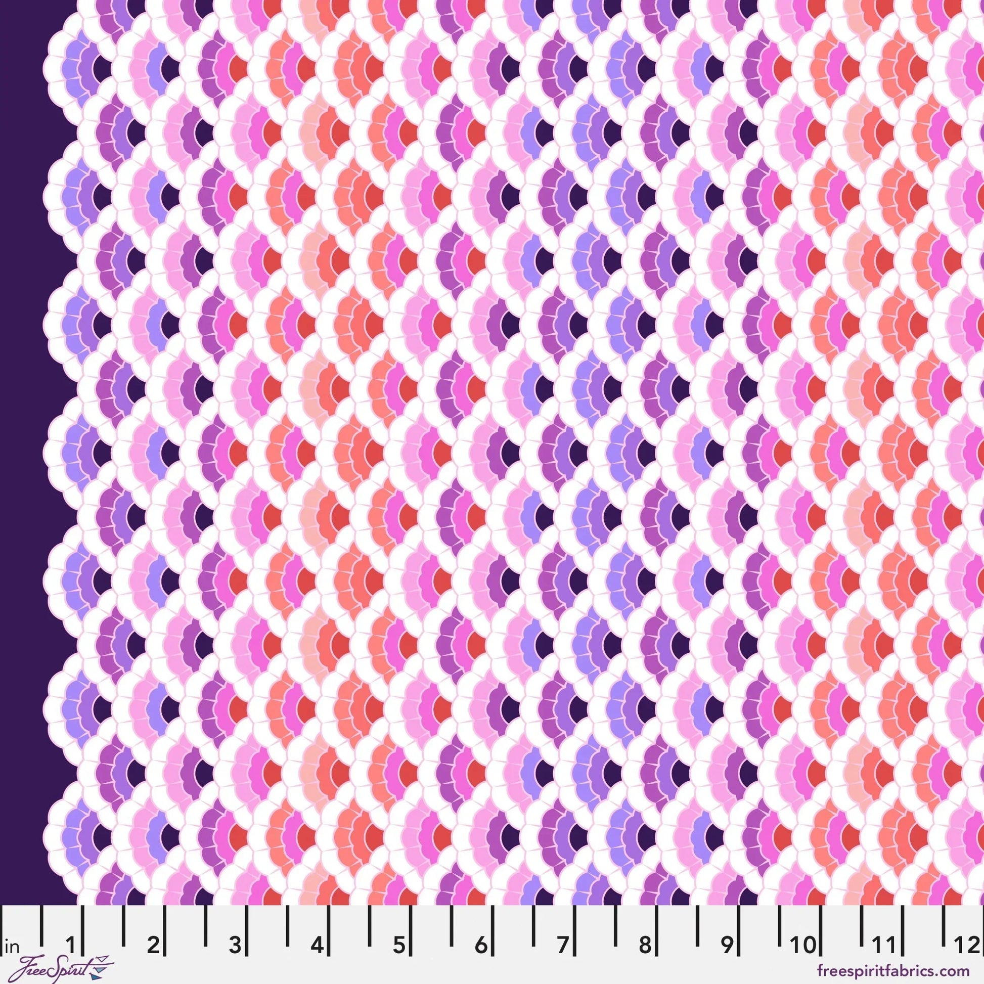 Geometric pattern of overlapping scalloped shapes with pink, coral, red, and purple colors on a dark background with a ruler for scale.