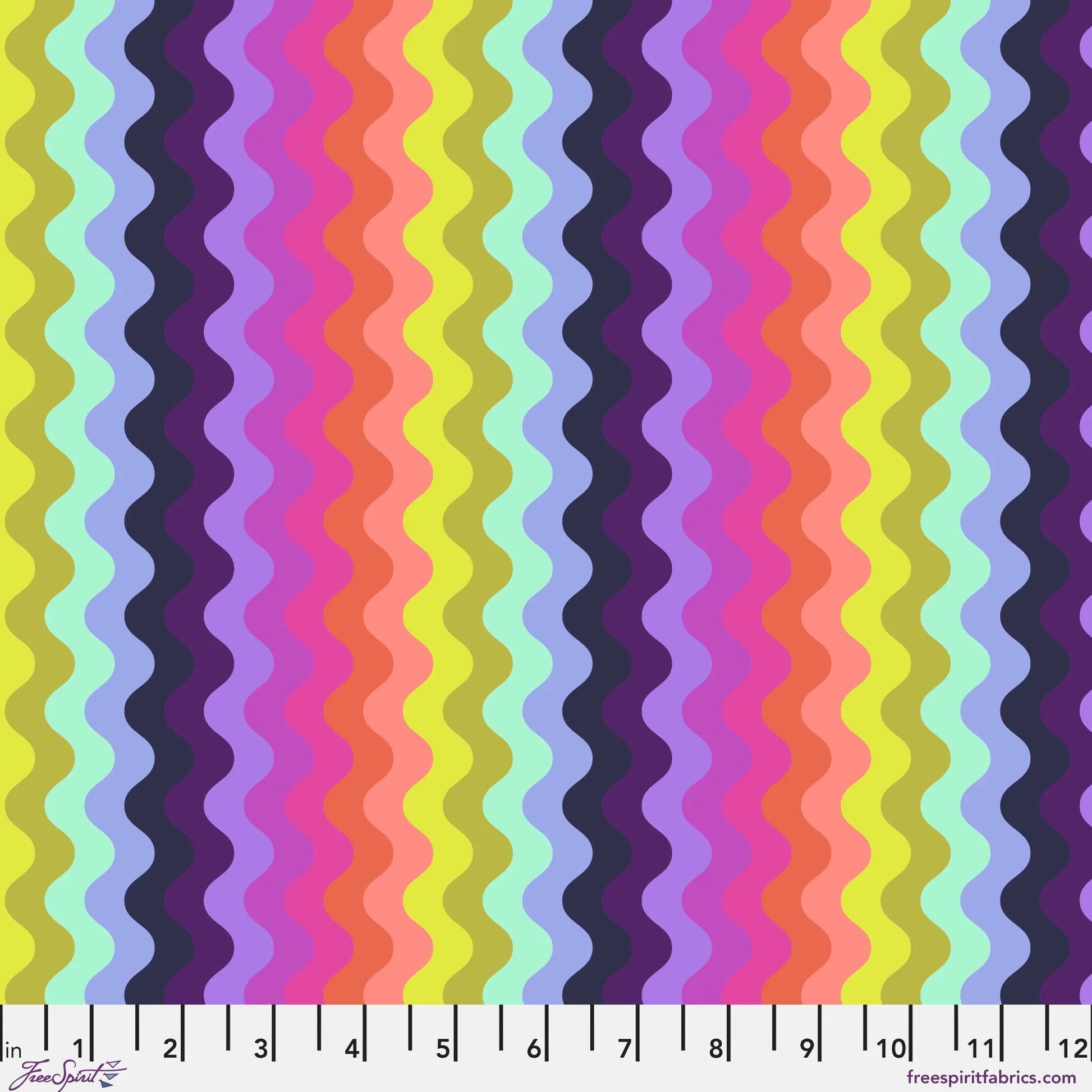 Pattern of undulating vertical waves in a rich, psychedelic sequence of colors, including chartreuse, mint, periwinkle, navy, lavender, magenta, pink, coral, and peach. Ruler at the bottom for scale.
