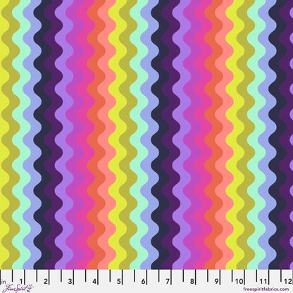 Pattern of undulating vertical waves in a rich, psychedelic sequence of colors, including chartreuse, mint, periwinkle, navy, lavender, magenta, pink, coral, and peach. Ruler at the bottom for scale.