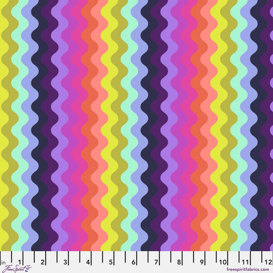 Pattern of undulating vertical waves in a rich, psychedelic sequence of colors, including chartreuse, mint, periwinkle, navy, lavender, magenta, pink, coral, and peach. Ruler at the bottom for scale.