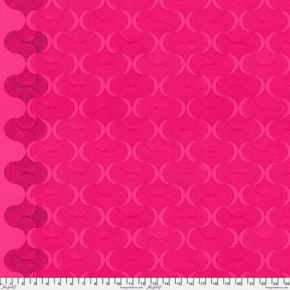 Grace Mindful in Fuchsia features large, undulating pink waves on a fuchsia background. This bright, textured ogee design includes a darker stripe of color parallel to each selvage edge.