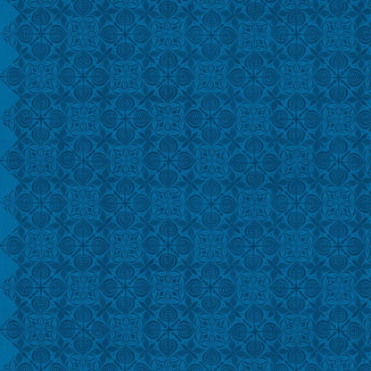 Grace Curious in Sapphire features large navy tiles with intricate floral designs arranged on a royal blue background. This tone-on-tone geometric design is set on a diagonal with the points meeting the selvage edges.