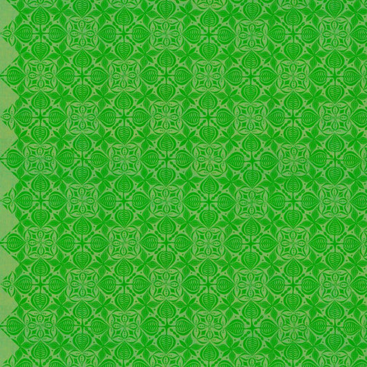 Grace Curious in Sorrel features large, bright green tiles with intricate floral designs arranged on a lime background. This tone-on-tone geometric design is set on a diagonal with the points meeting the selvage edges.