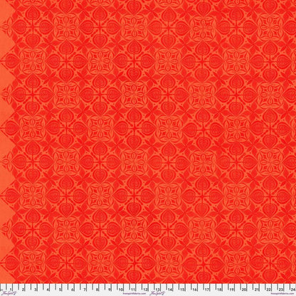 Grace Curious in Tangerine features large orange tiles with intricate floral designs arranged on a light, peach background. This tone-on-tone geometric design is set on a diagonal with the points meeting the selvage edges.