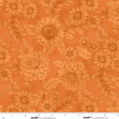 Floral pattern with sunflowers on an orange background with a ruler for scale.