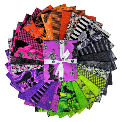 A fanned-out bundle of colorful fabric squares in vivid purples, oranges, greens, grays, and blacks, featuring floral designs, moths, spiderwebs, stripes, and abstract shapes with a Fat Quarter Bundle in the center.