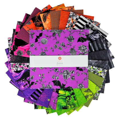 A fanned-out bundle of colorful fabric squares in vivid purples, oranges, greens, grays, and blacks, featuring floral designs, moths, spiderwebs, stripes, and abstract shapes with a 10" Layer Cake in the center.