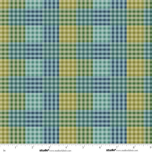Plaid pattern with green, blue, and teal colors and a ruler at the bottom for scale.