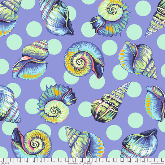 Colorful detailed shell pattern on a purple background with aqua polka dots. Ruler at the bottom for scale.