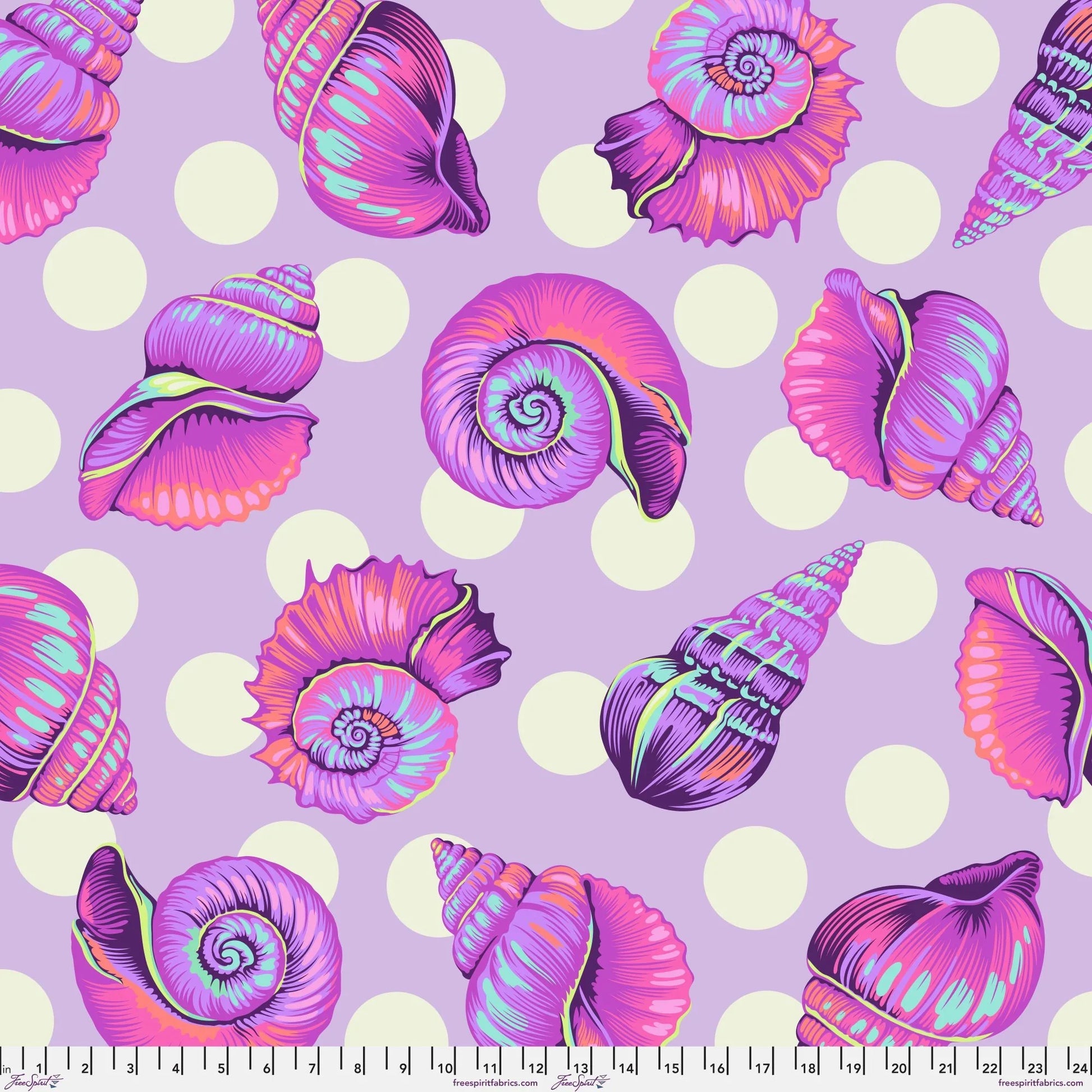 Colorful detailed shell pattern on a lavender background with white polka dots. Ruler at the bottom for scale.