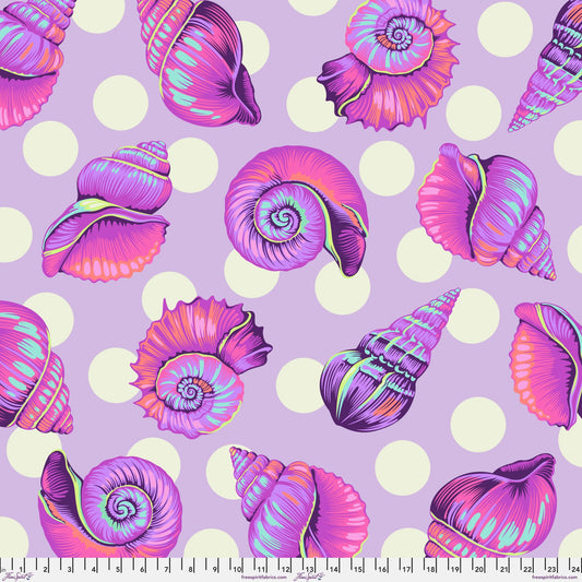 Colorful detailed shell pattern on a lavender background with white polka dots. Ruler at the bottom for scale.