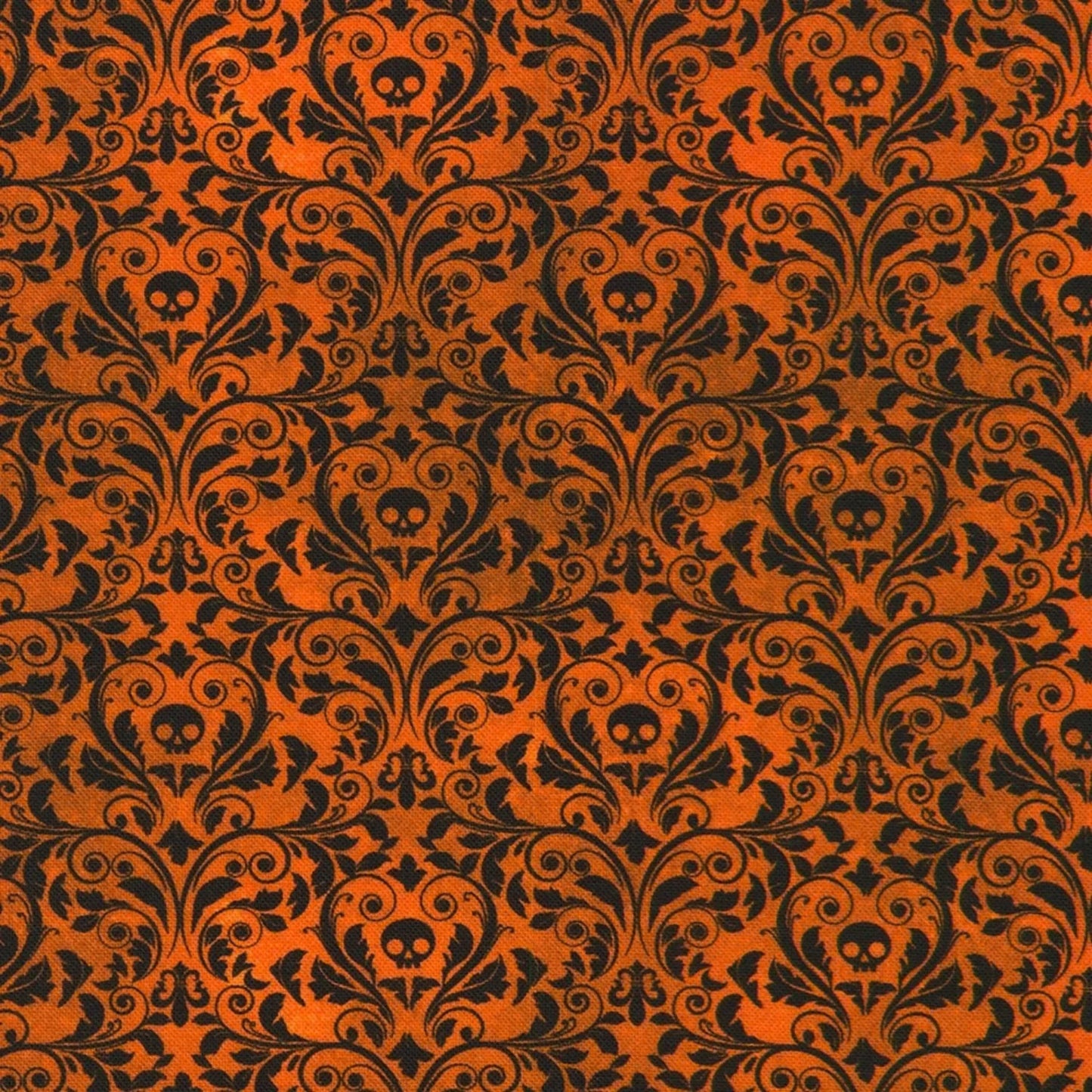 An ornate black damask pattern with small skull motifs on a warm, burnt-orange background. 