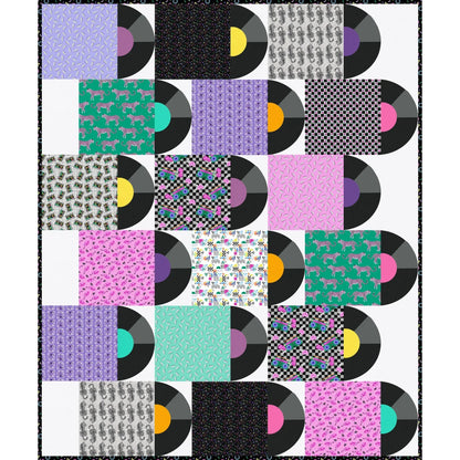 Patchwork quilt with vinyl record design on a white background