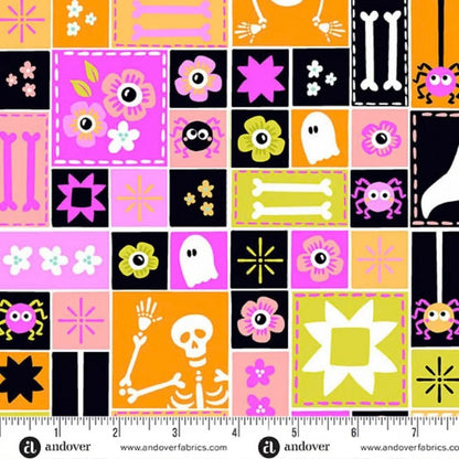 Colorful sampler-style print with Halloween-themed blocks and a ruler for scale.