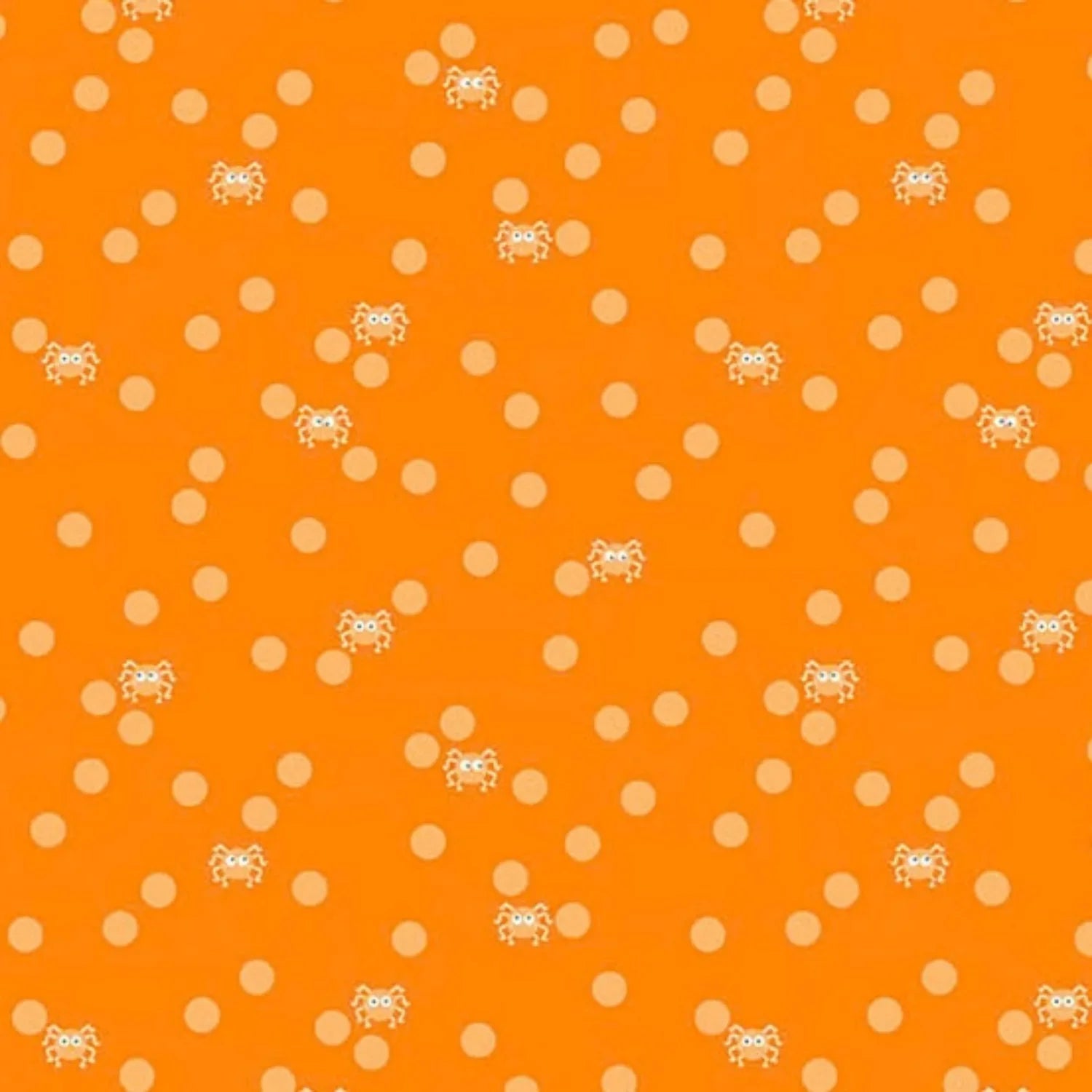 Orange fabric with peach polka dots and small cartoon spiders