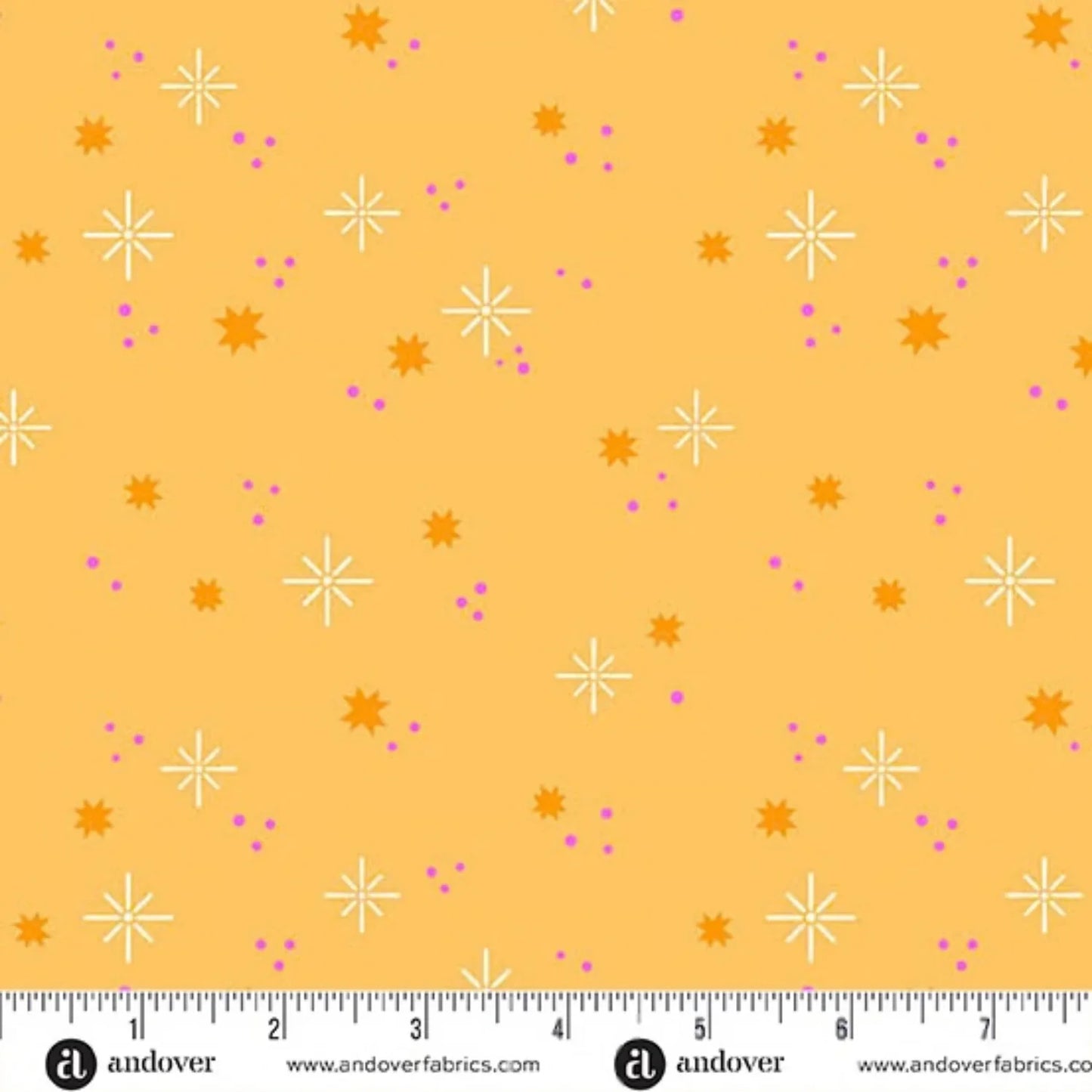 Pattern of stars and dots on a pale orange background with a ruler for scale.