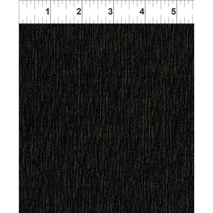 Solid black fabric swatch with a textured pattern and a ruler at the top for scale