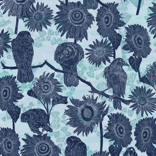 Pattern of navy blue birds and sunflowers on a powder blue background.