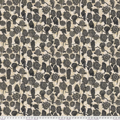 Pattern of black crows and sunflowers on a soft beige background with a ruler for scale