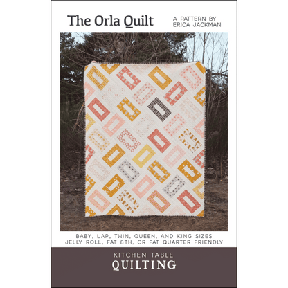 The Orla Quilt Pattern from Kitchen Table Quilting is a simple, quick way to turn a jelly roll, fat eighth bundle, or fat quarter bundle into a striking quilt with lots of movement.