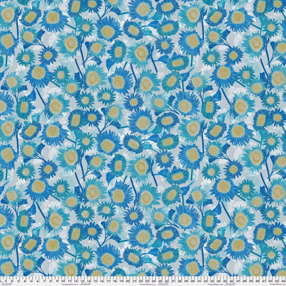 Pattern of blue and yellow flowers on a light blue background with a ruler at the bottom for scale.