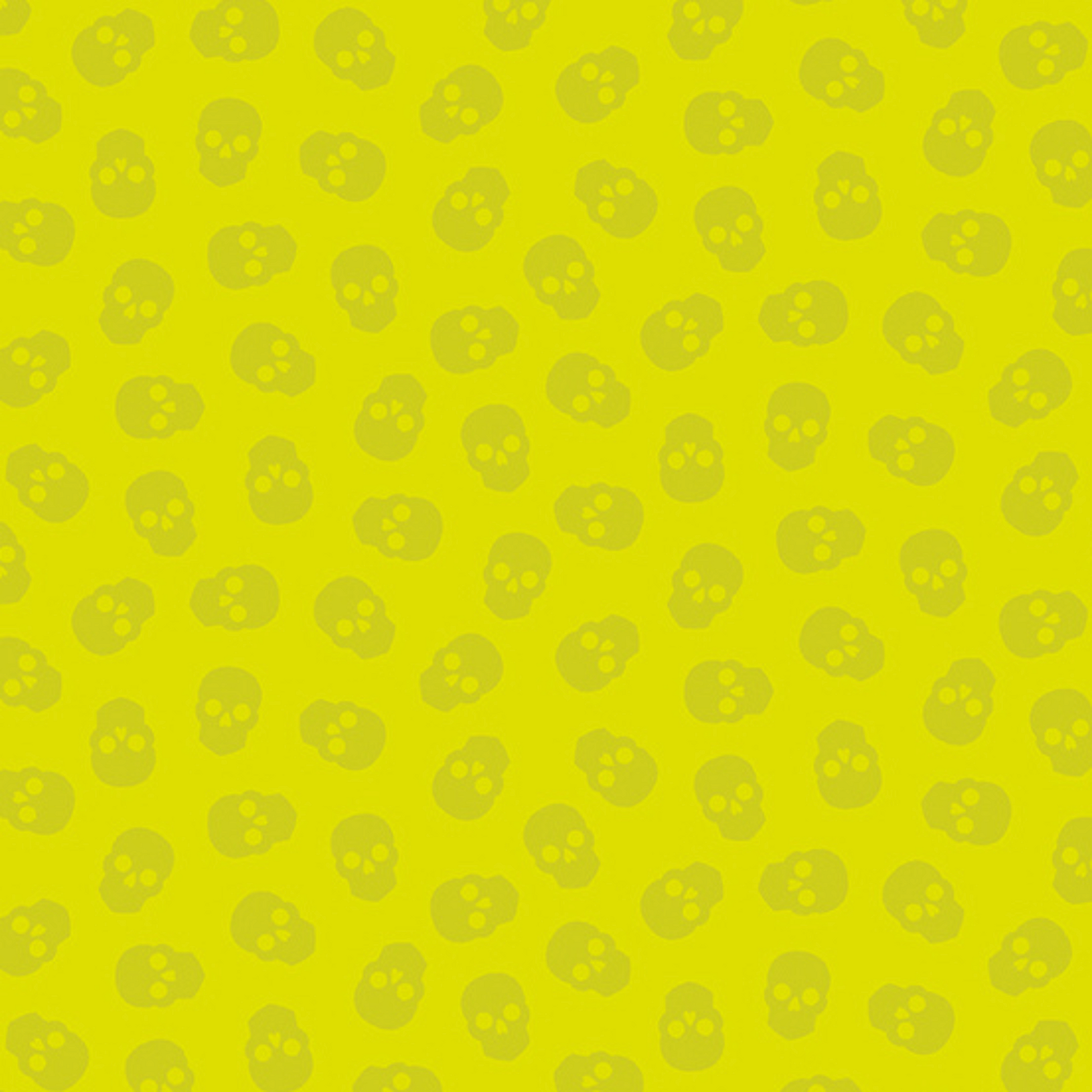 The Watcher Tainted Love in Citrus features small lime green skulls tossed across a neon green background.