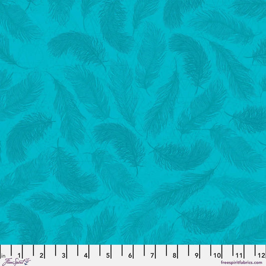 Pattern of blue feathers on a textured aqua background with a ruler for scale.