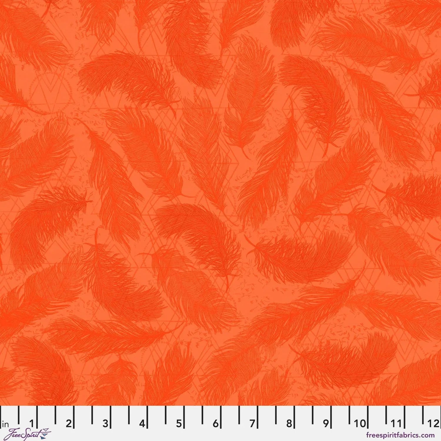 Pattern of red-orange feathers on a textured orange background with a ruler for scale.