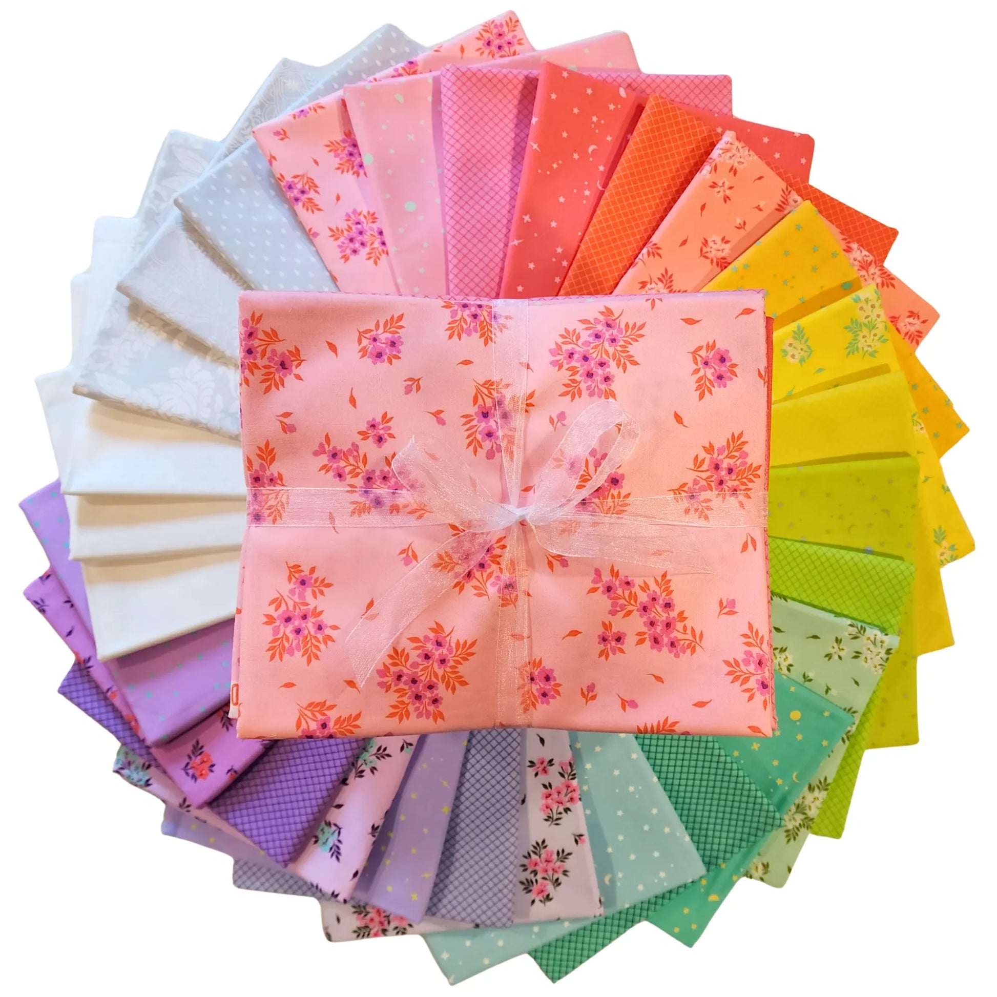 Colorful fabric swatches are arranged in a circular pattern with a one-yard bundle in the center.