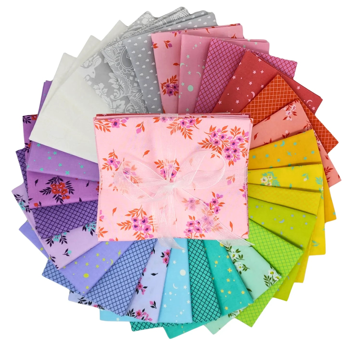 Colorful fabric swatches are arranged in a circular pattern with a fat quarter bundle in the center.