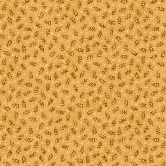 Pattern of small leaves on a golden background.