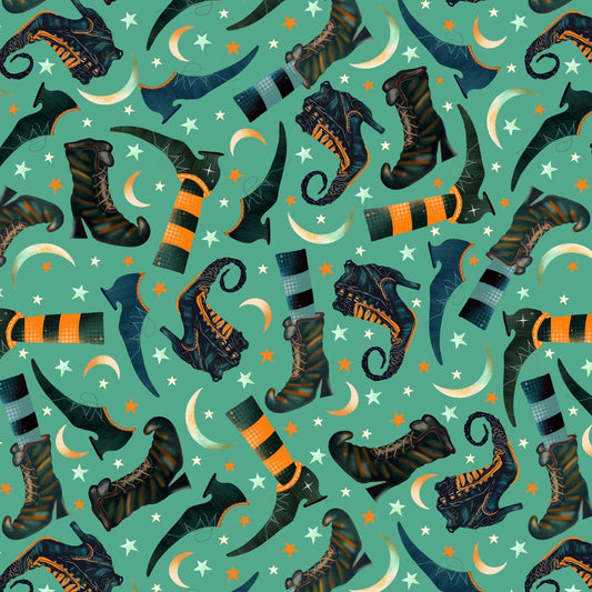 Pattern of witch boots, striped stockings, crescent moons, and stars on a teal background.