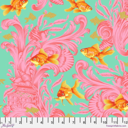 Besties Treading Water in Blossom features bright orange goldfish swimming among pink aquatic plants, seashells, and pirate treasure against an aqua blue background. Metallic gold silhouettes of fish sparkle in the background.
