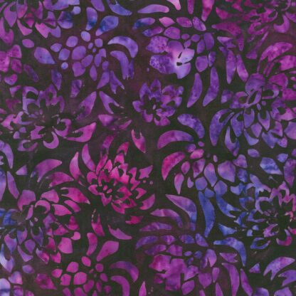 Kapua Lotus in Plum Artisan Batik is a stunning hand-dyed fabric featuring blended pink and purple lotus flowers tossed across a deep purple background. 