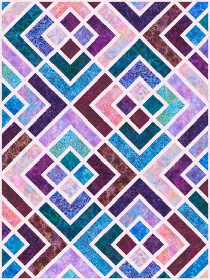 The Kapua Penny Quilt Kit is a gorgeous combination of rich, jewel-toned batiks and soft pastel sashing that creates a look reminiscent of stained glass.